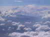 Immagini di volo a vela - alianti ed aeroporti - Borgo San Lorenzo - Nello squarcio delle nubi, in distanza verso ovest i rilievi del Corno alle Scale